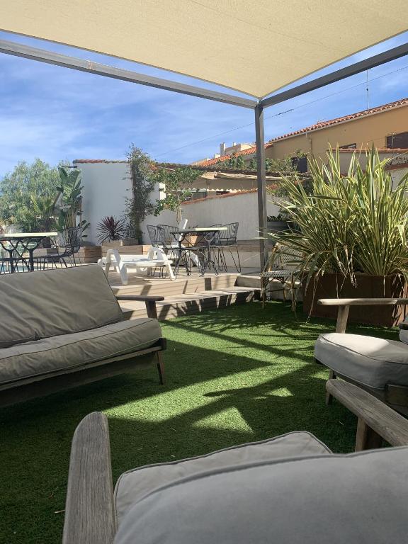 Posezení v ubytování Hôtel Les Sables - Urban Style - by Logis Hotels