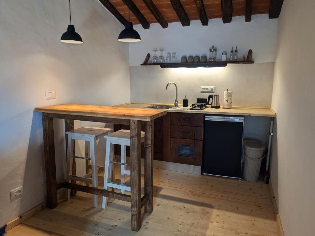 Kuchyň nebo kuchyňský kout v ubytování Il Palazzo, Le Fornaci