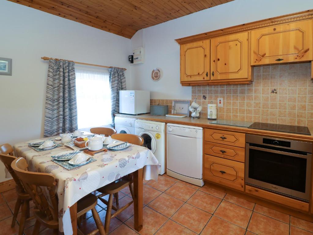 Kuchyň nebo kuchyňský kout v ubytování Rose Cottage