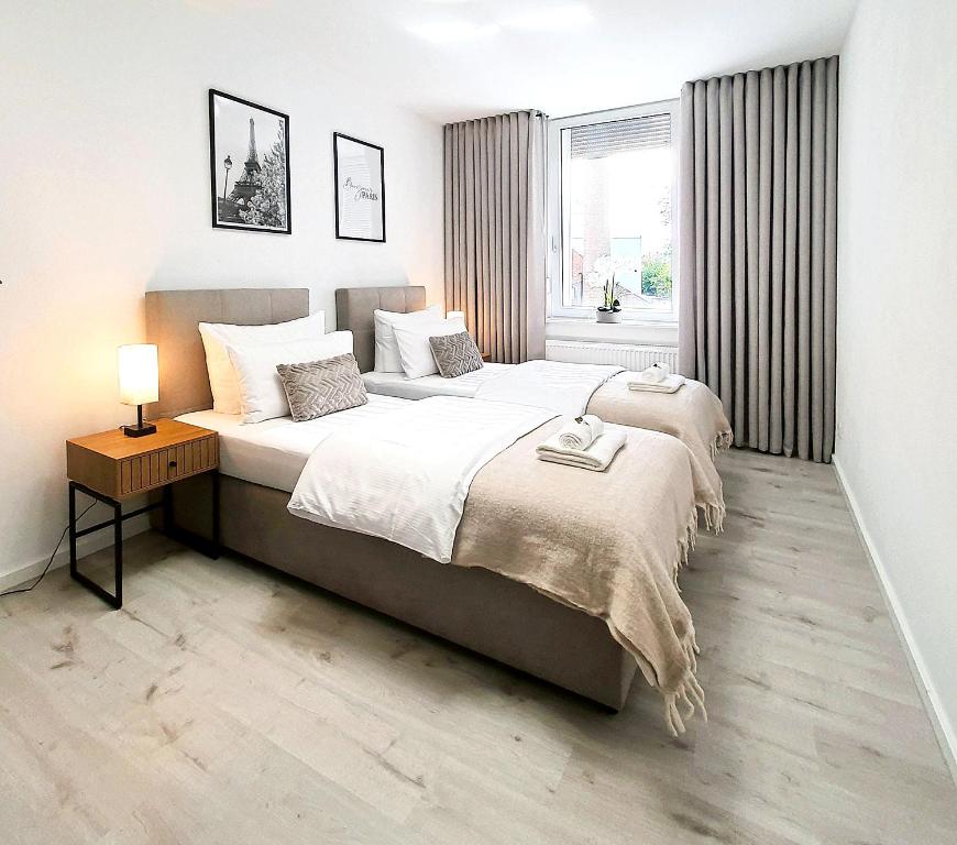 LIVATION - Apartments Hamm-Mitte - 2 Zi - Nespresso - SmartTV - freeWiFi - ausgestattete Küche - 24h Check-In - bis 4 Pers pro Apartment - Appartamento Deluxe Con 1 Camera Da Letto