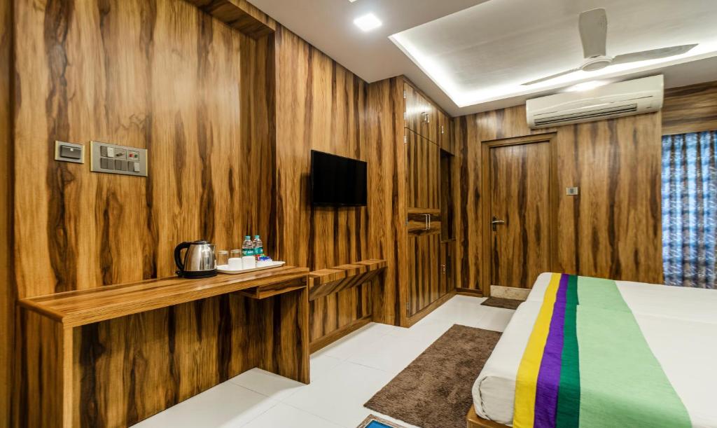 TV a/nebo společenská místnost v ubytování Hotel Orion Crystal