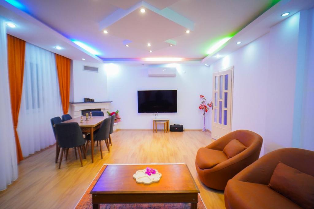 A television and/or entertainment centre at Villa SOLEMARE DEMRE