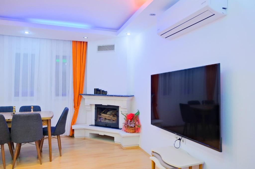 A television and/or entertainment centre at Villa SOLEMARE DEMRE