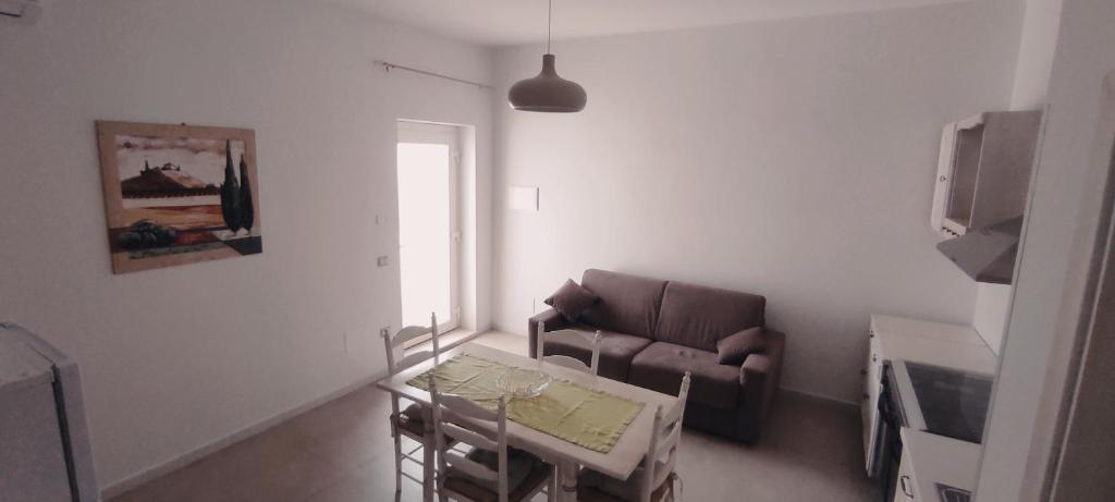 Posezení v ubytování Deluxe Family Suite