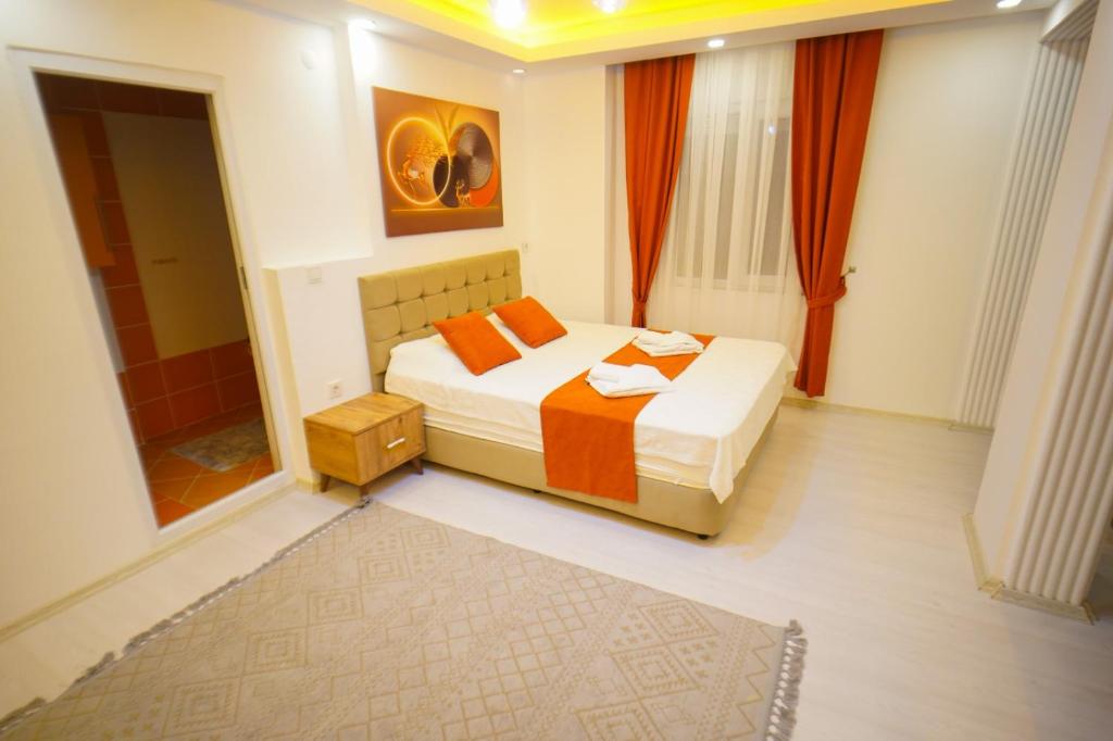 A bed or beds in a room at Villa SOLEMARE DEMRE