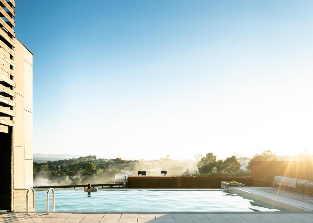 Bazén v ubytování Puro Dão Hotel & Spa nebo v jeho okolí