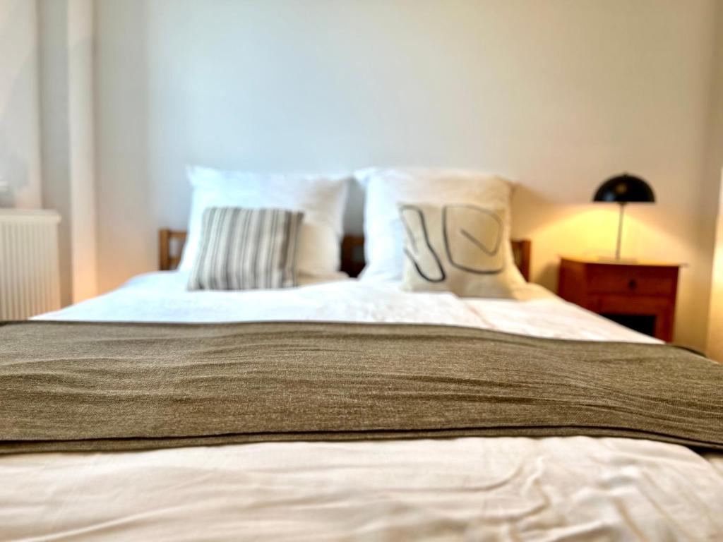 Katil atau katil-katil dalam bilik di Gästezimmer am Schlosspark Groß Schacksdorf