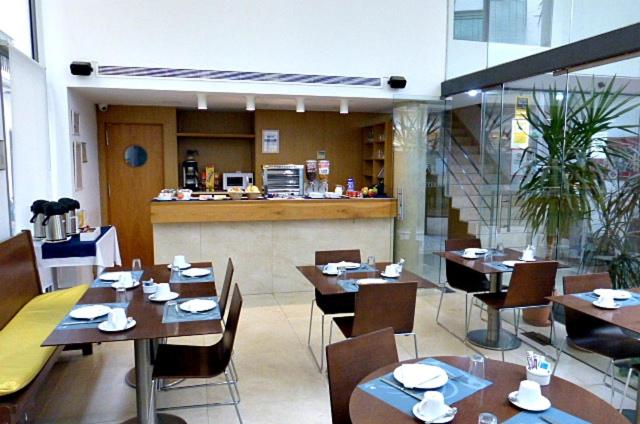 Reštaurácia alebo iné gastronomické zariadenie v ubytovaní Apartamentos Patagonia Sur