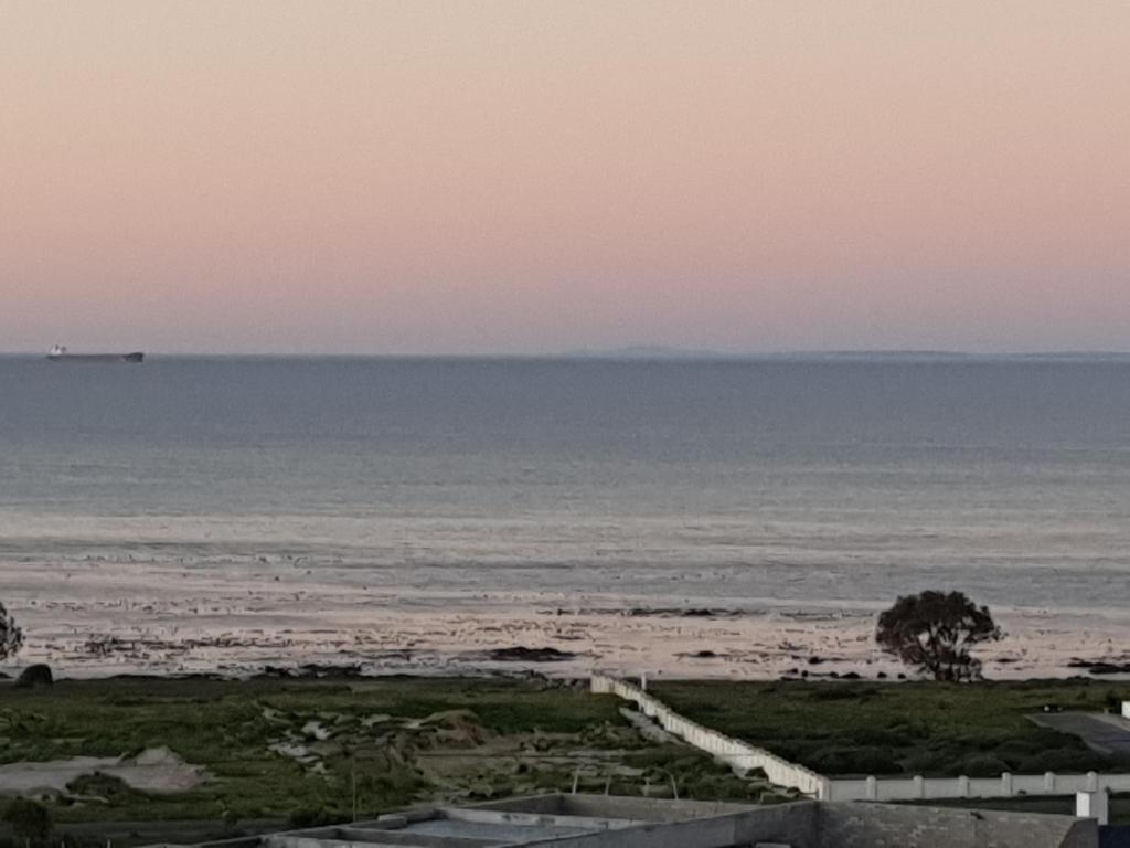 a view of the beach at sunset at Sassa in St Helena Bay
