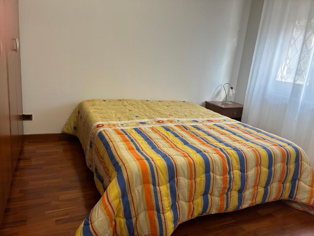 Łóżko lub łóżka w pokoju w obiekcie Villa Andalù Appartamenti