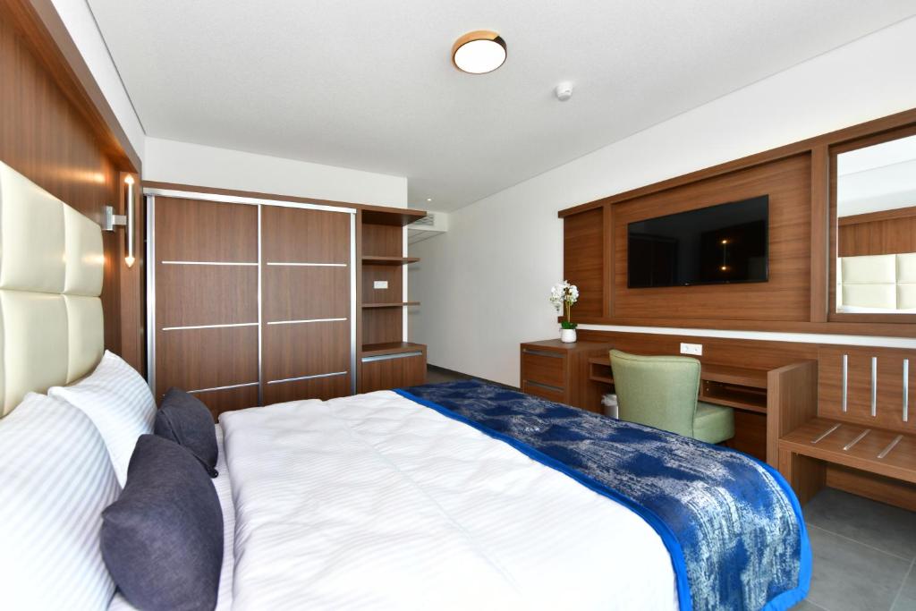 Postel nebo postele na pokoji v ubytování Korki's Motel