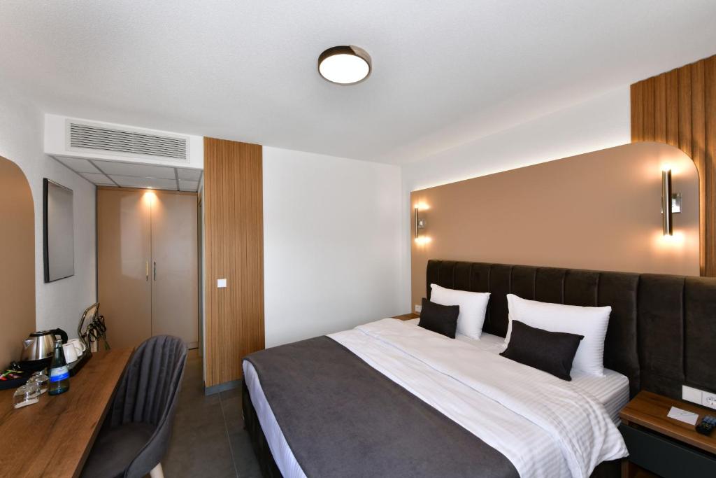Postel nebo postele na pokoji v ubytování Korki's Motel