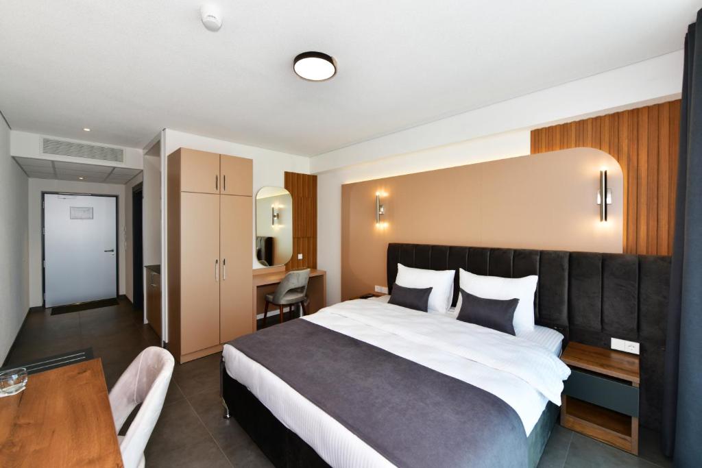 Postel nebo postele na pokoji v ubytování Korki's Motel