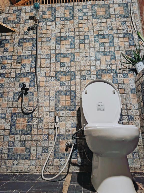 Koupelna v ubytování Yellow Coco Gili Gede