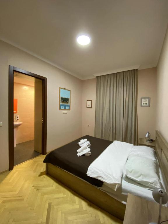 Postel nebo postele na pokoji v ubytování 8 rooms