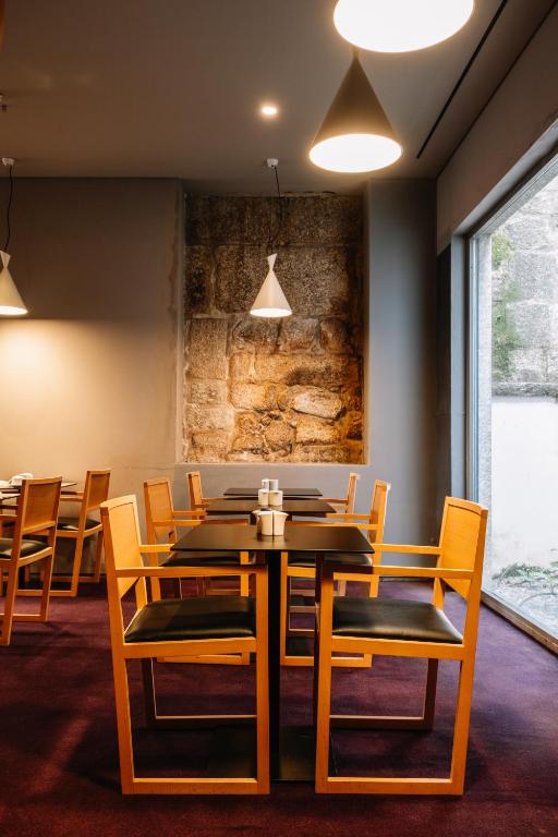 Posezení v ubytování EMAJ Boutique Hotel