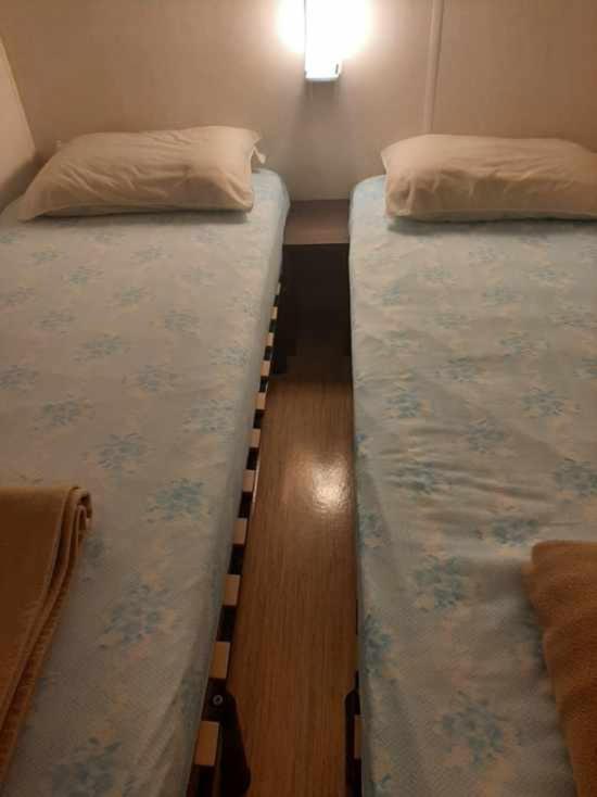 Postel nebo postele na pokoji v ubytování Paisible camping les 7 fonds