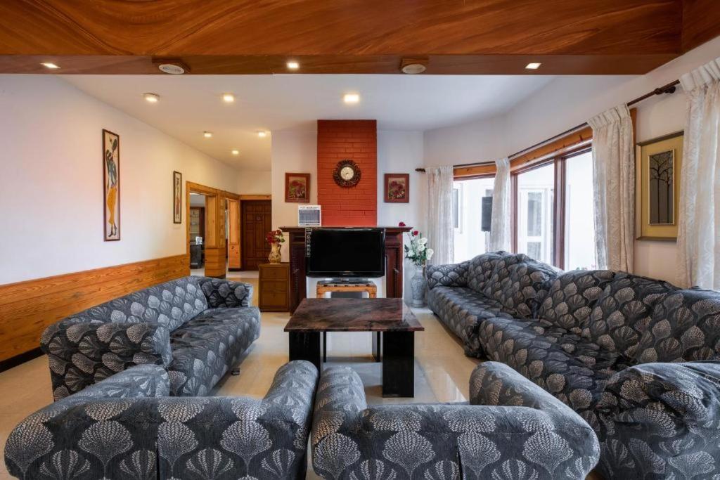 TV a/nebo společenská místnost v ubytování Mansarovar Holiday Home
