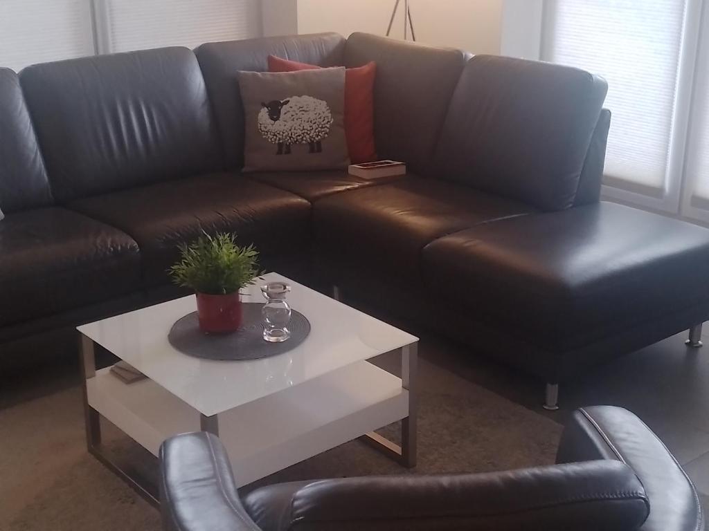 Posezení v ubytování watn Meerblick-Nordseepark Dangast, 2Schlafzimmer,2Bäder,Kamin,Parkplatz