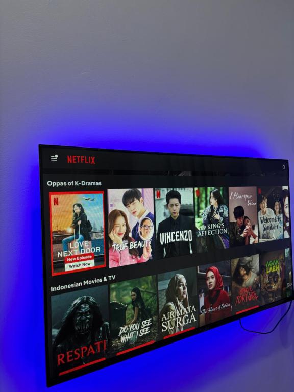 TV a/nebo společenská místnost v ubytování Idaman Cottage Sekinchan