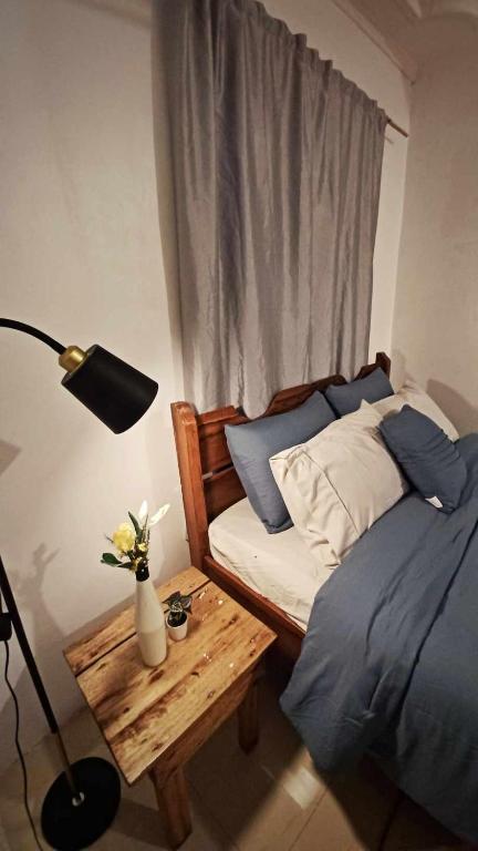 Postel nebo postele na pokoji v ubytování TOBY HOUSE SiARGAO