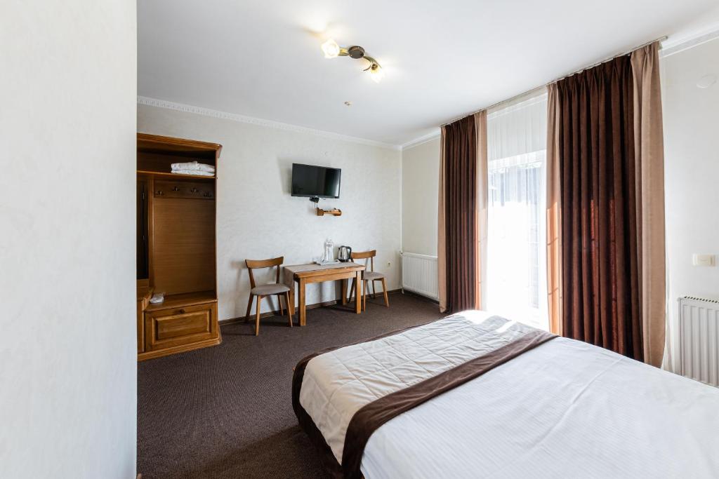 Postel nebo postele na pokoji v ubytování Hotel Bellavista & Spa