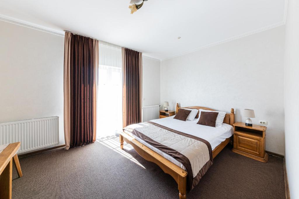 Postel nebo postele na pokoji v ubytování Hotel Bellavista & Spa