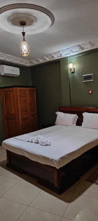 Postel nebo postele na pokoji v ubytování Ma'a Lapseu hôtel