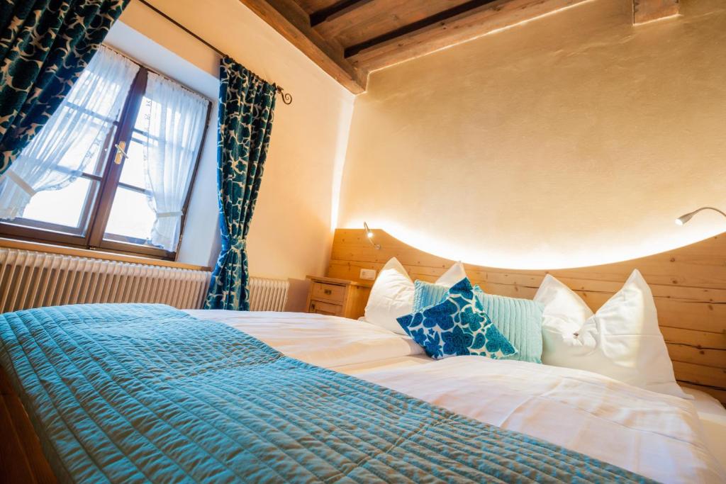 Posteľ alebo postele v izbe v ubytovaní Hotel Fahrnberger
