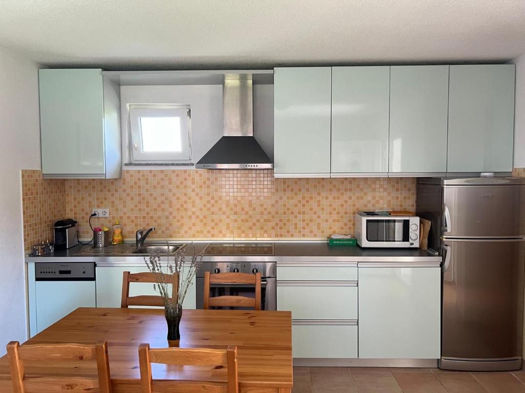 Kuchyň nebo kuchyňský kout v ubytování Minihaus in Zagreb