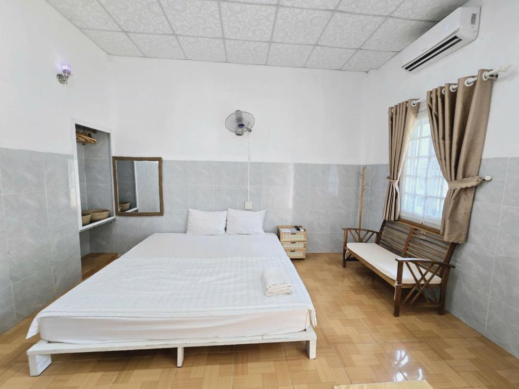 Giường trong phòng chung tại Lac House Mui Ne