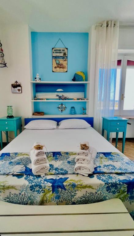 Postel nebo postele na pokoji v ubytování B&B DOÑA FLOR