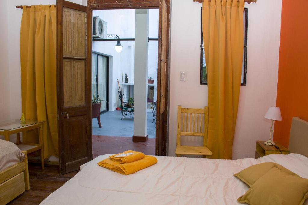 Postel nebo postele na pokoji v ubytování Casa Mboyeré