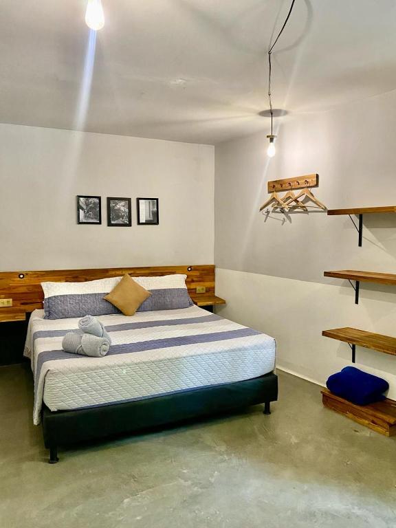 Postel nebo postele na pokoji v ubytování Casa Mosaiko Patio Bonito