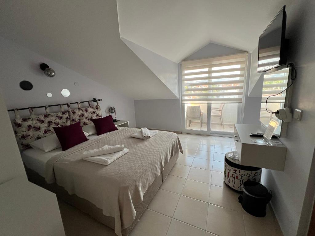 Кровать или кровати в номере Casablanca Hotel