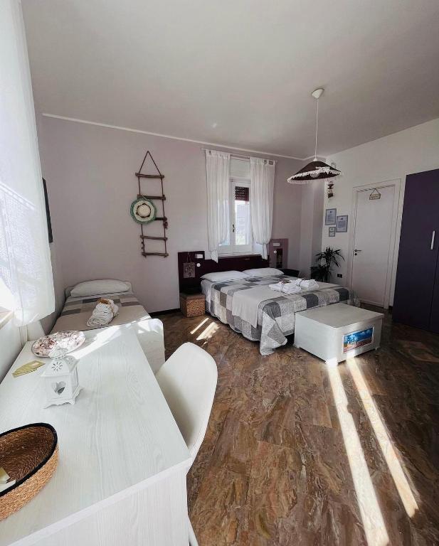 Postel nebo postele na pokoji v ubytování B&B DOÑA FLOR
