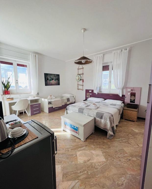 Postel nebo postele na pokoji v ubytování B&B DOÑA FLOR