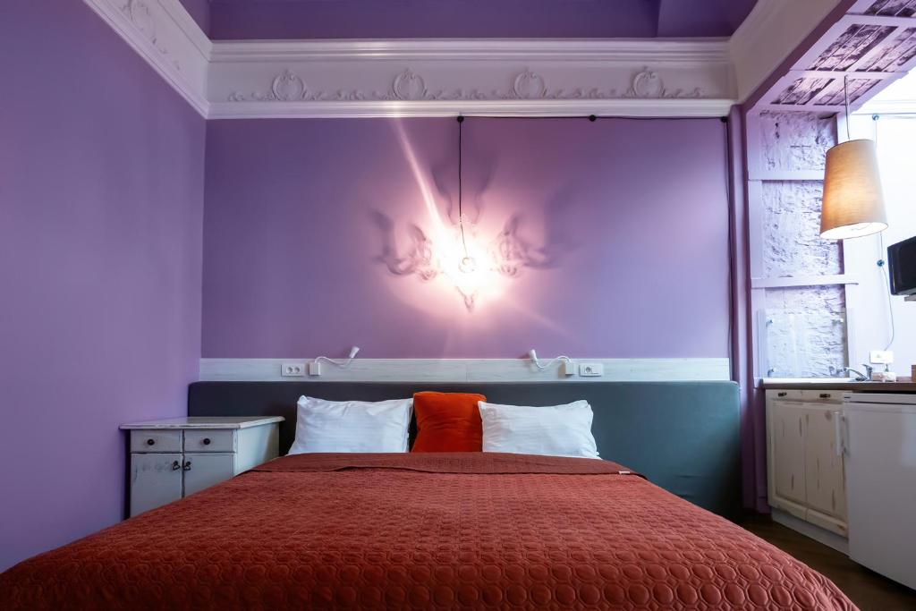 Postel nebo postele na pokoji v ubytování Apart Hotel Michelle