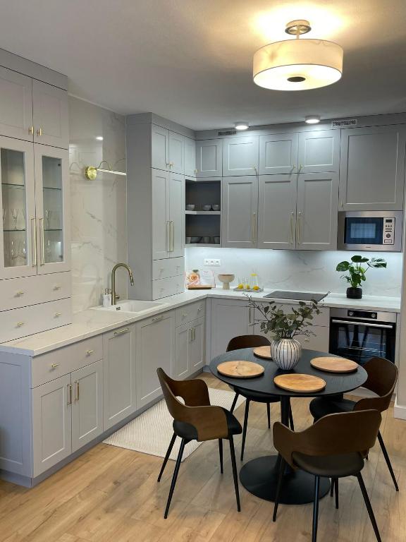 Kuchyňa alebo kuchynka v ubytovaní Apartman Slovenská Ľupča
