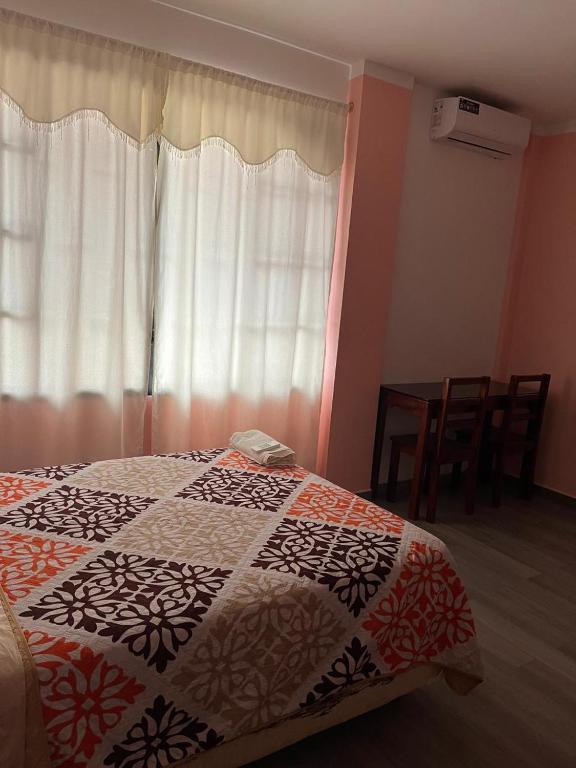 Postel nebo postele na pokoji v ubytování Casa Alexita