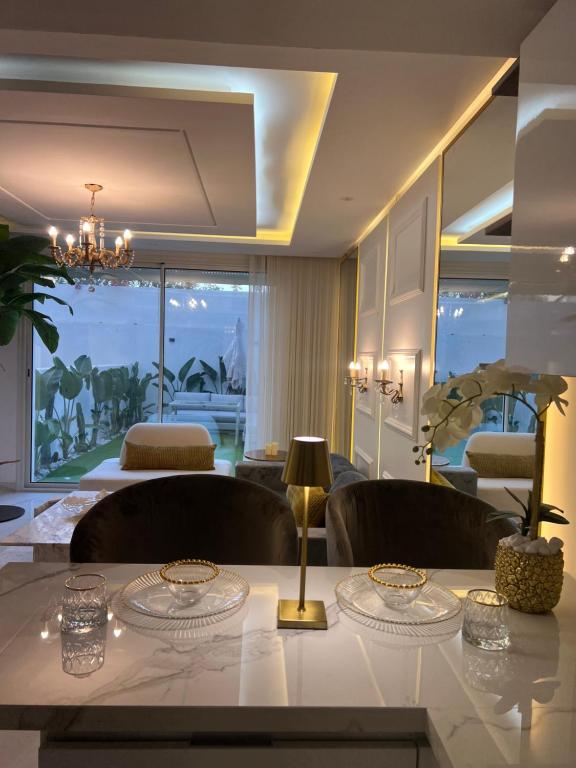 Posezení v ubytování Luxueux appart-hotel