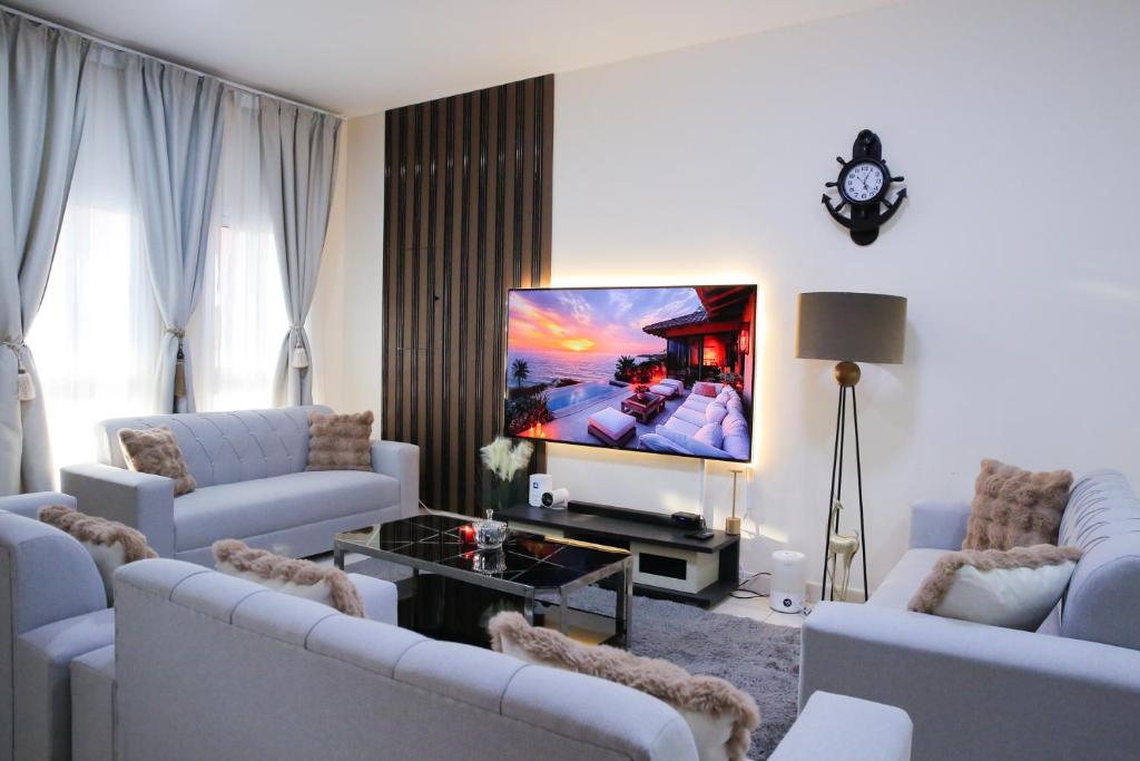 TV a/nebo společenská místnost v ubytování Agoo Homes
