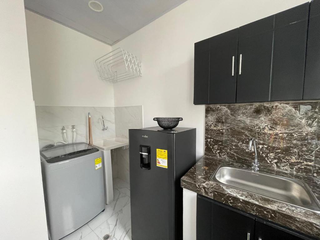 Η κουζίνα ή μικρή κουζίνα στο Apartamento central- Río Agencia