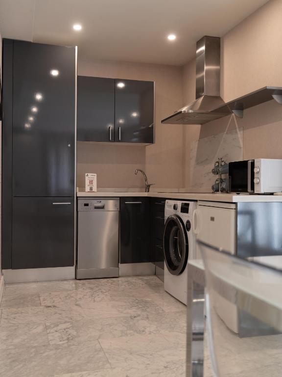 Kuchyň nebo kuchyňský kout v ubytování Alisé Apartments Tetuán, by Homing U