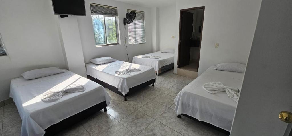 Postel nebo postele na pokoji v ubytování Hotel Bayadera Real