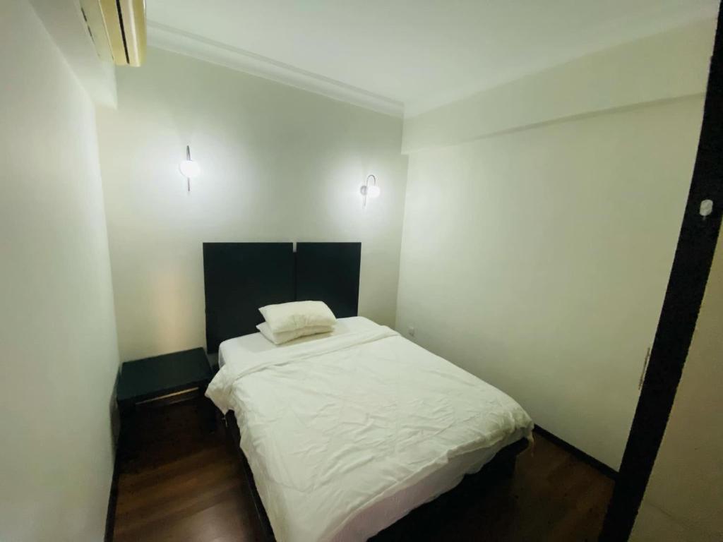 Ένα ή περισσότερα κρεβάτια σε δωμάτιο στο Luxury Room At Bukit Bintang