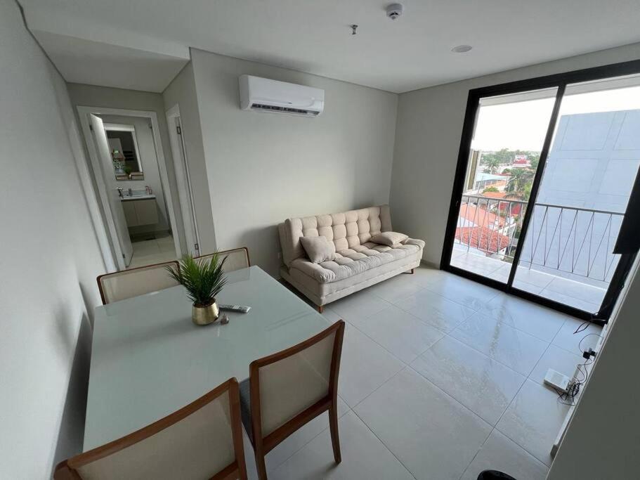 Χώρος καθιστικού στο Departamento Home Ycua Sati