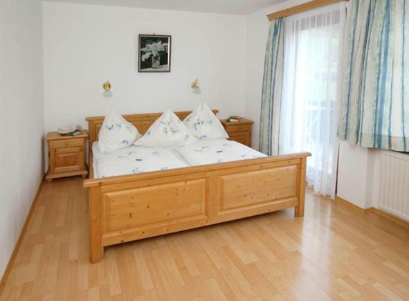 A bed or beds in a room at Bauernhof Serner