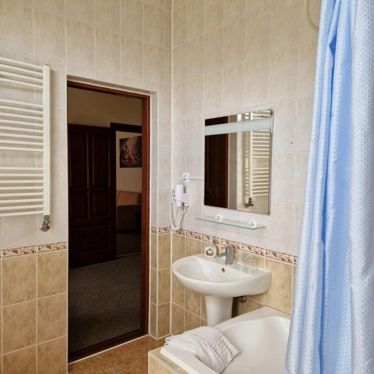 Koupelna v ubytování Hotel Helikon