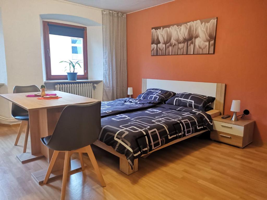 Postel nebo postele na pokoji v ubytování Pension am Kirchberg - Zimmer 1